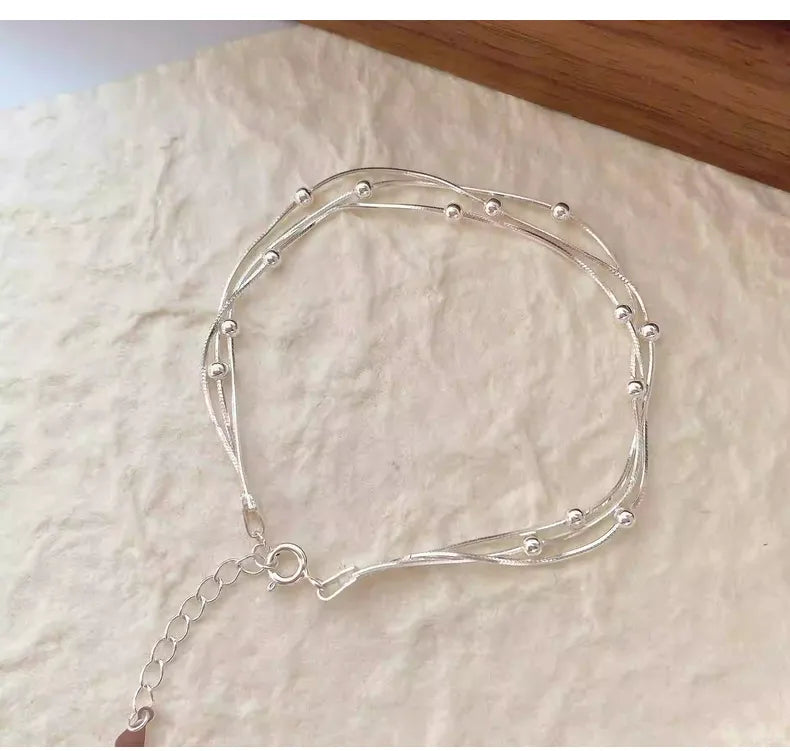 LUNIVAX Élan™ S925 Sterling Silver Triple-Layer Bracelet