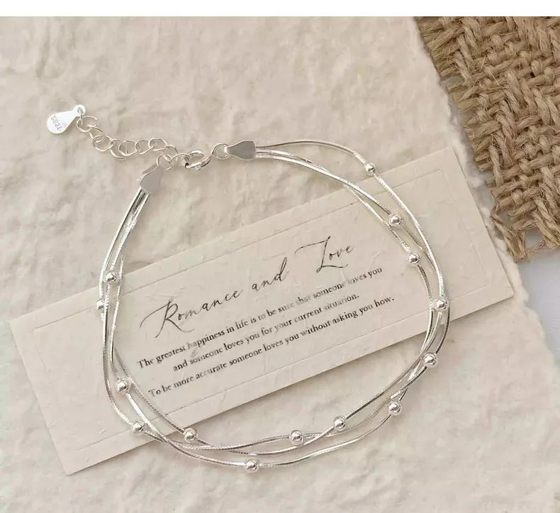 LUNIVAX Élan™ S925 Sterling Silver Triple-Layer Bracelet