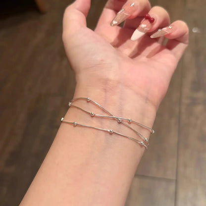 LUNIVAX Élan™ S925 Sterling Silver Triple-Layer Bracelet