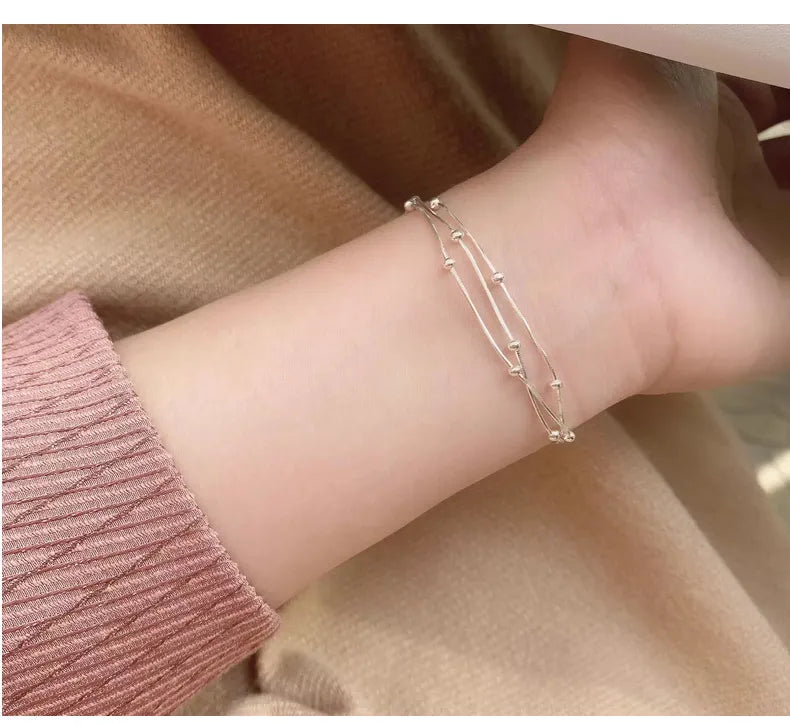 LUNIVAX Élan™ S925 Sterling Silver Triple-Layer Bracelet
