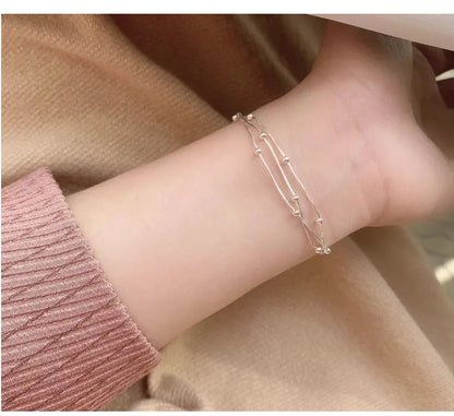 LUNIVAX Élan™ S925 Sterling Silver Triple-Layer Bracelet